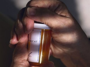 opening prescription bottle